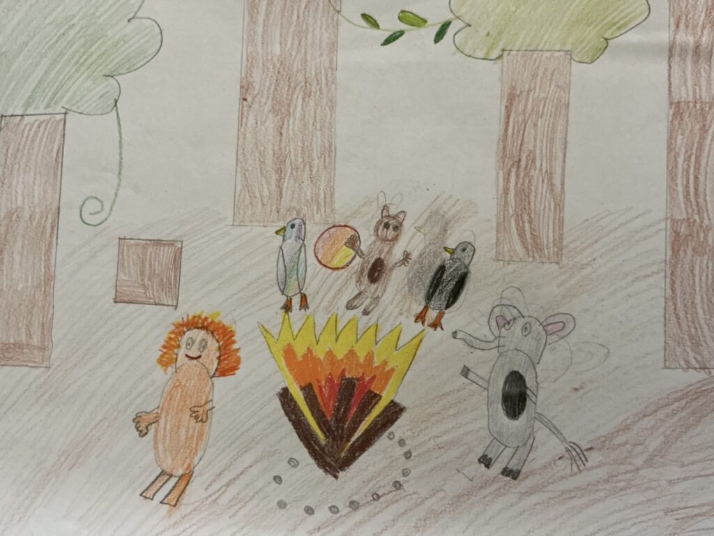 eine Kinderzeichnung, die Tiere am Lagerfeuer zeigt